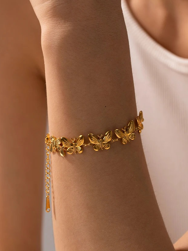 Yelina | Elegant Guld Armband – Fjärilsdesign För Unik Stil 1