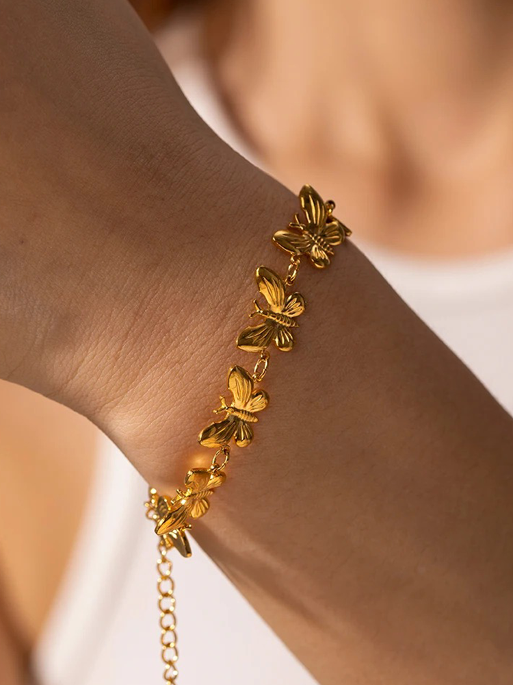 Yelina | Elegant Guld Armband – Fjärilsdesign För Unik Stil 2