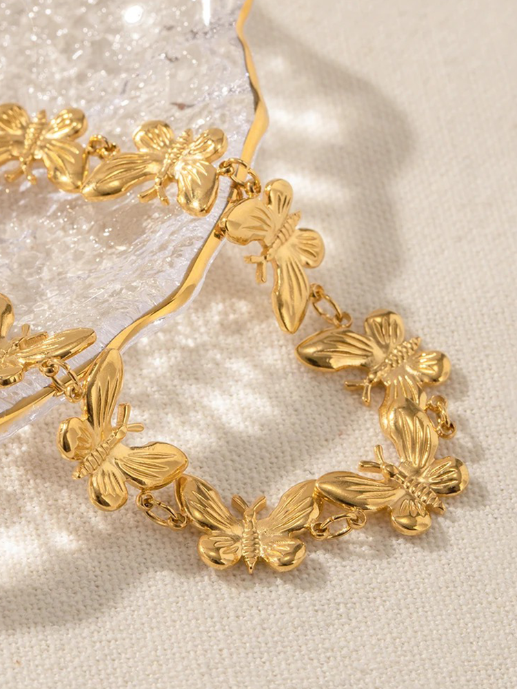 Yelina | Elegant Guld Armband – Fjärilsdesign För Unik Stil 3