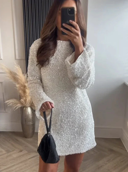Lorena | Elegant Svart Miniklänning – Unik Båge Och Textur 5
