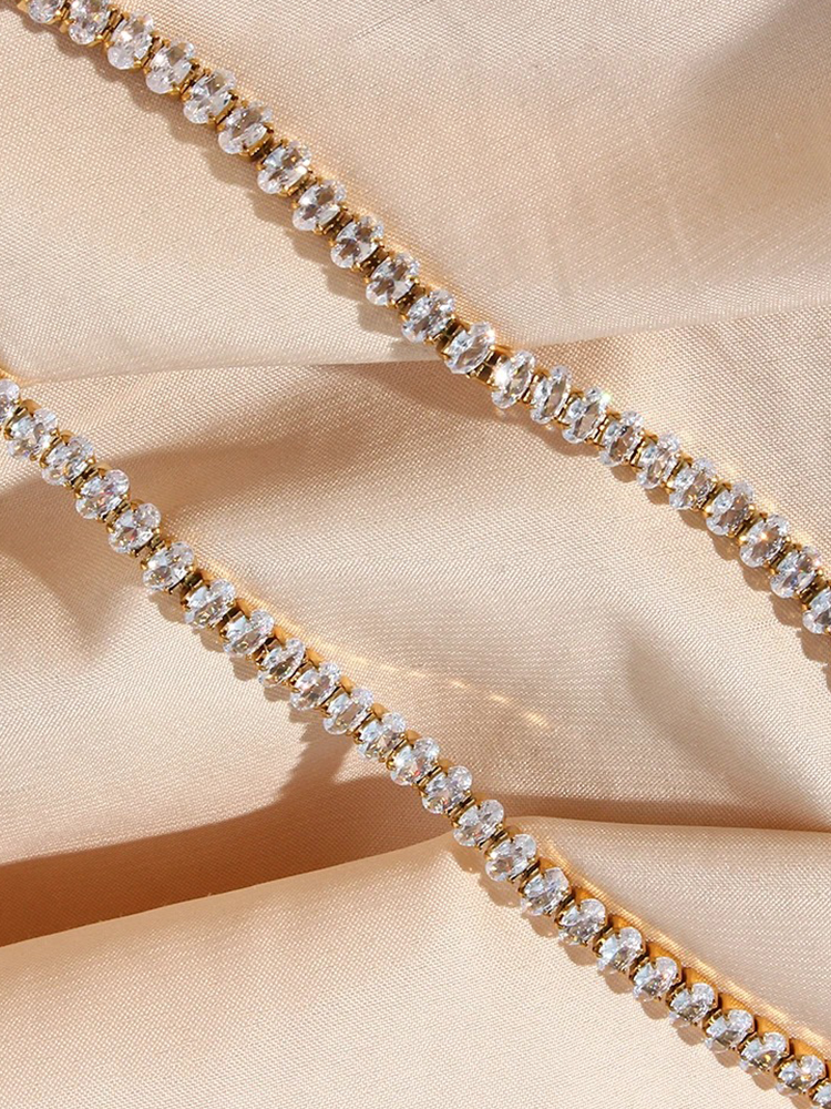 Norah | Elegant Tennisarmband – Ovala Stenar i Guld 3