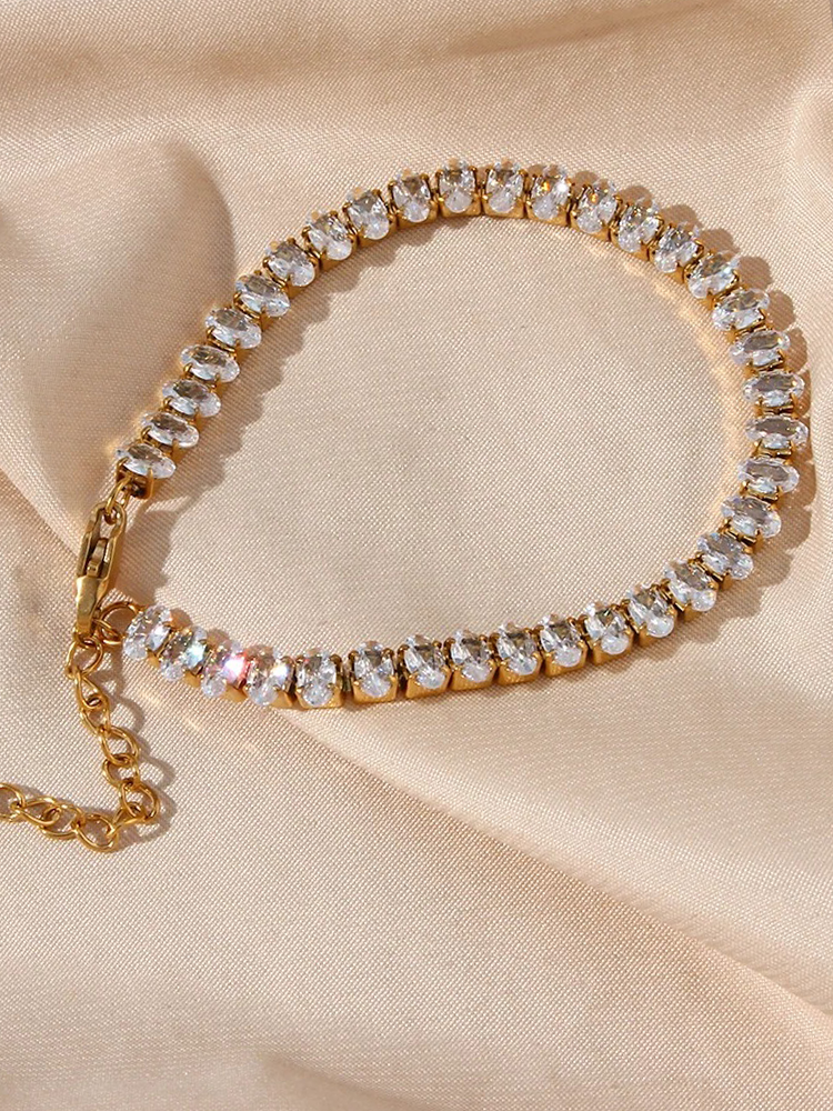 Norah | Elegant Tennisarmband – Ovala Stenar i Guld 4